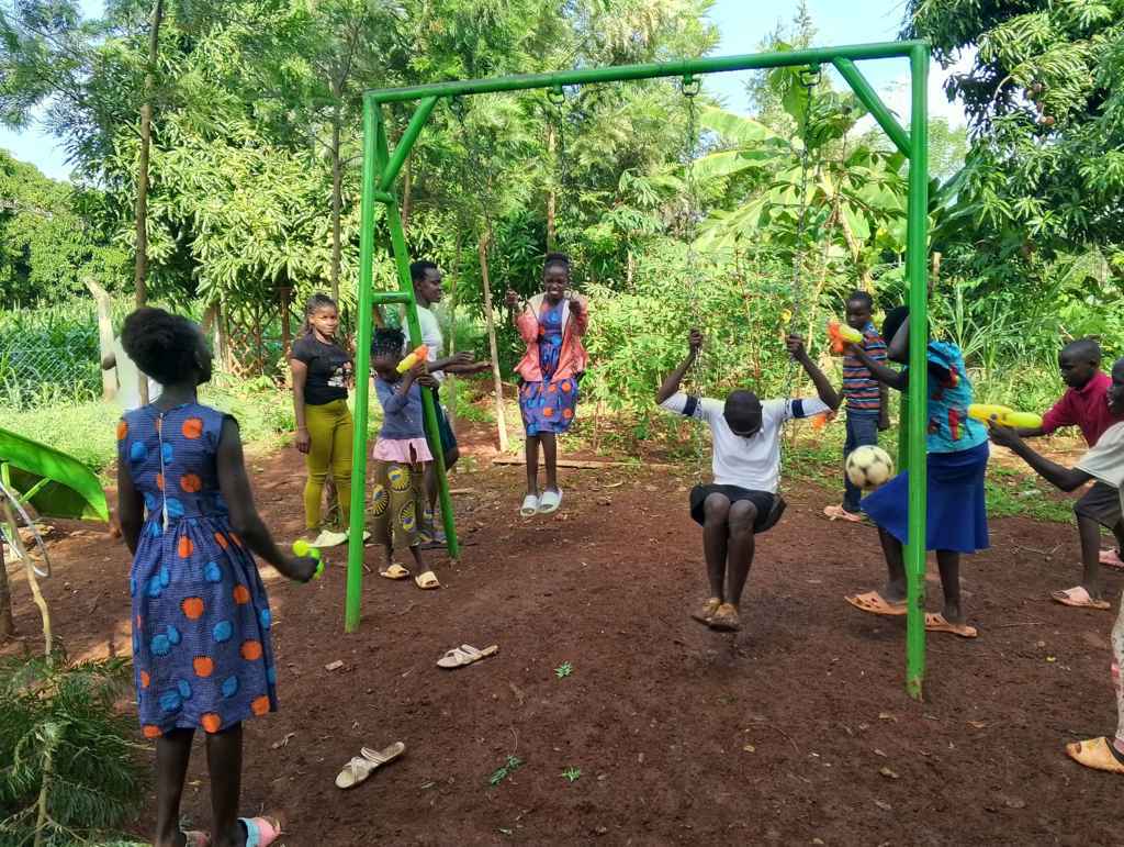 Jackline and Olive Playing with other children